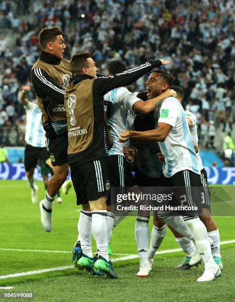 Marcos Rojo of Argentina celebrates with teammates after scoring his team's second goal during the 2018 FIFA World Cup Russia group D match between...