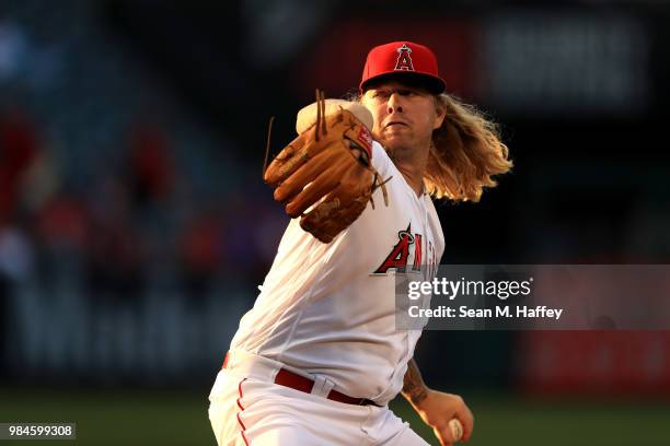 John Lamb of the Los Angeles Angels of Anaheim pitches during the first inning of a game against the Toronto Blue Jays at Angel Stadium on June 21,...