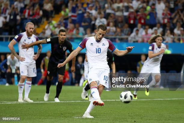 Gylfi Sigurdsson of Iceland scores his sides opening goal from a penalty to make the score 1-1 during the 2018 FIFA World Cup Russia group D match...