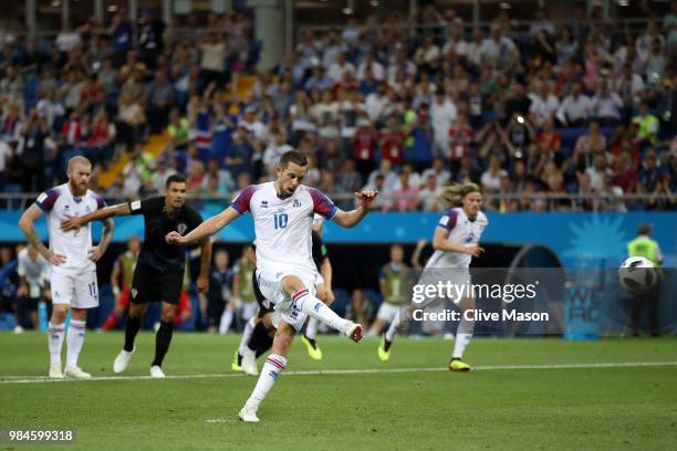 Gylfi Sigurdsson of Iceland scores his sides opening goal from a penalty to make the score 1-1 during the 2018 FIFA World Cup Russia group D match...