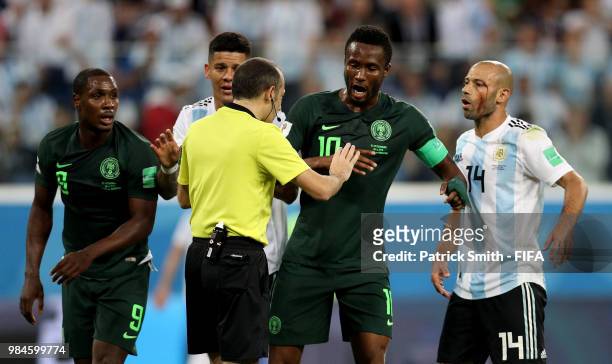 Referee Cuneyt Cakir listens to his headphones after Nigeria appeals for a penalty whic will be not given during the 2018 FIFA World Cup Russia group...