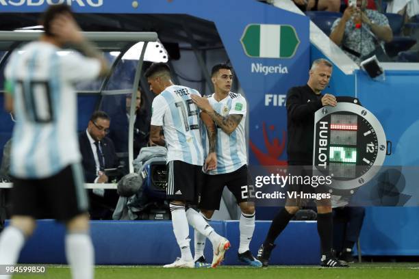 Enzo Perez of Argentina, Cristian Pavon of Argentina, assistant referee Bjorn Kuipers during the 2018 FIFA World Cup Russia group D match between...