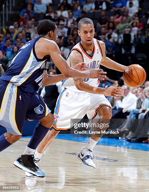 Eric Maynor of the Oklahoma City Thunder drives past Mike Conley of the Memphis Grizzlies on April 14, 2010 at the Ford Center in Oklahoma City,...