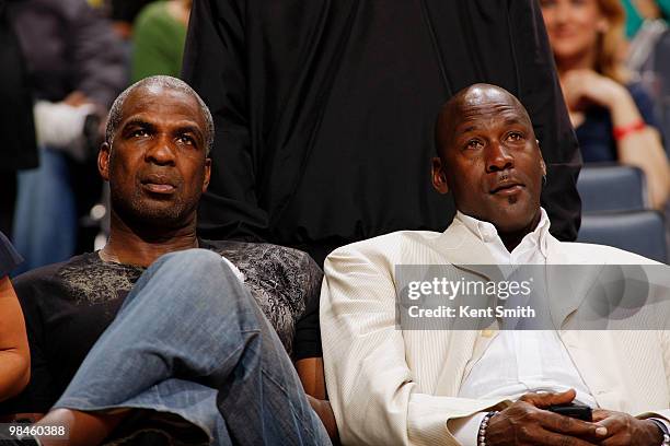 Charles Oakley and Michael Jordan watch the game of the Charlotte Bobcats against the Chicago Bulls on April 14, 2010 at the Time Warner Cable Arena...