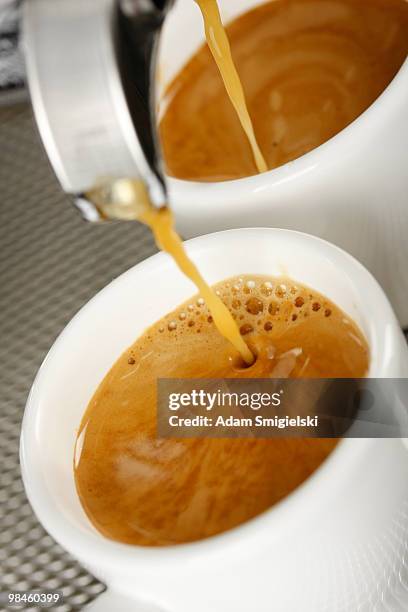 two cups of espresso shot with crema - color crema stockfoto's en -beelden