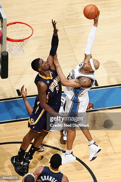 James Singleton of the Washington Wizards shoots against Roy Hibbert of the Indiana Pacers at the Verizon Center on April 14, 2010 in Washington, DC....