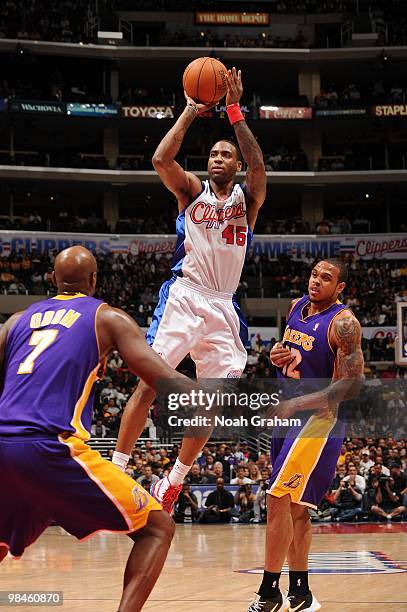 Rasual Butler of the Los Angeles Clippers shoots against Lamar Odom of the Los Angeles Lakers at Staples Center on April 14, 2010 in Los Angeles,...