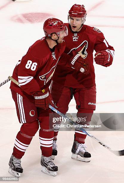 Wojtek Wolski of the Phoenix Coyotes celebrates with teammate Matthew Lombardi after Wolski scored a second-period power-play goal against the...