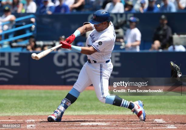 Yangervis Solarte of the Toronto Blue Jays bats in the first inning during MLB game action against the Washington Nationals at Rogers Centre on June...