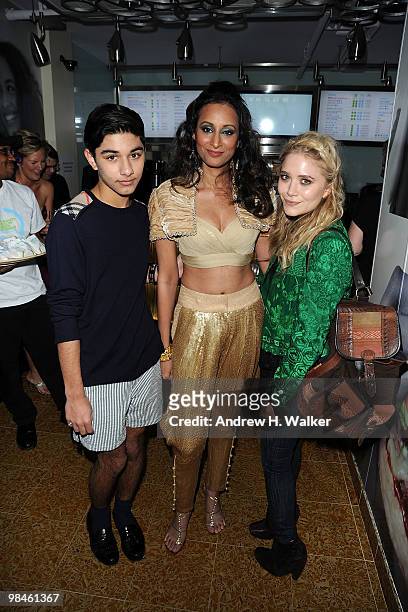 Mark Indelicato, Otarian owner Radhika Oswal and Mary-Kate Olsen attend the grand opening celebration of Otarian, the planet's most sustainable...