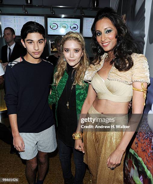 Mark Indelicato, Mary-Kate Olsen and Otarian owner Radhika Oswal attend the grand opening celebration of Otarian, the planet's most sustainable...