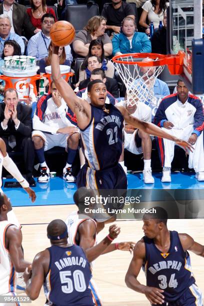 Rudy Gay of the Memphis Grizzlies dunks one over the Oklahoma City Thunder defense on April 14, 2010 at the Ford Center in Oklahoma City, Oklahoma....