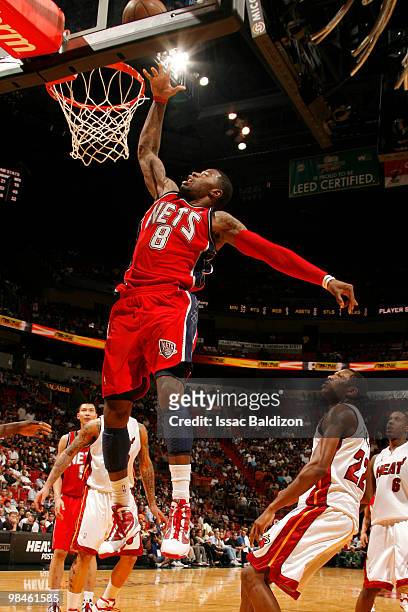 Terrence Williams of the New Jersey Nets shoots against the Miami Heat on April 14, 2010 at American Airlines Arena in Miami, Florida. NOTE TO USER:...
