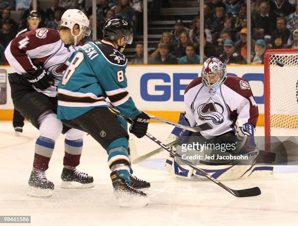 Goalie Craig Anderson of the Colorado Avalanche makes a save against Joe Pavelski of the San Jose Sharks in Game One of the Western Conference...