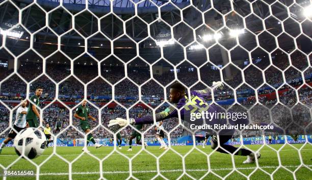 Marcos Rojo of Argentina scores pasr Francis Uzoho of Nigeria his team's second goal during the 2018 FIFA World Cup Russia group D match between...