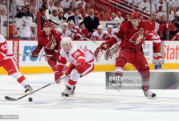 Brian Rafalski of the Detroit Red Wings steals the puck from Matthew Lombardi of the Phoenix Coyotes in Game One of the Western Conference...
