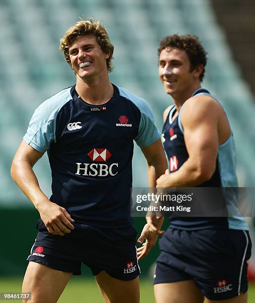 Berrick Barnes shares a joke with Patrick Phibbs during a Waratahs Super 14 training session at the Sydney Football Stadium on April 15, 2010 in...