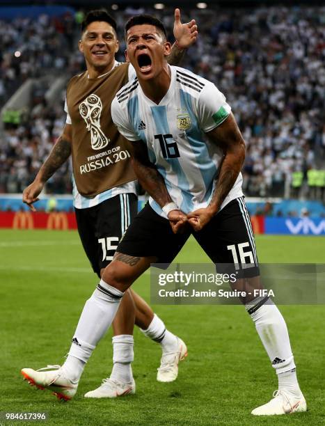 Marcos Rojo of Argentina celebrates after scoring his team's second goal as Enzo Perez looks on during the 2018 FIFA World Cup Russia group D match...