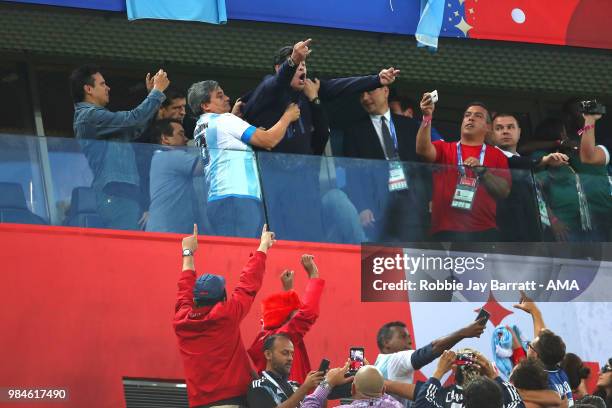 Argentina legend Diego Maradona celebrates after Marcos Rojo of Argentina scored a goal to make it 1-2 during the 2018 FIFA World Cup Russia group D...