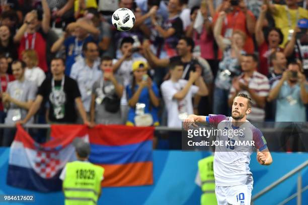 Iceland's midfielder Gylfi Sigurdsson celebrates after scoring a goal during the Russia 2018 World Cup Group D football match between Iceland and...