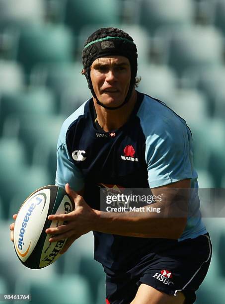 Berrick Barnes runs with the ball during a Waratahs Super 14 training session at the Sydney Football Stadium on April 15, 2010 in Sydney, Australia.