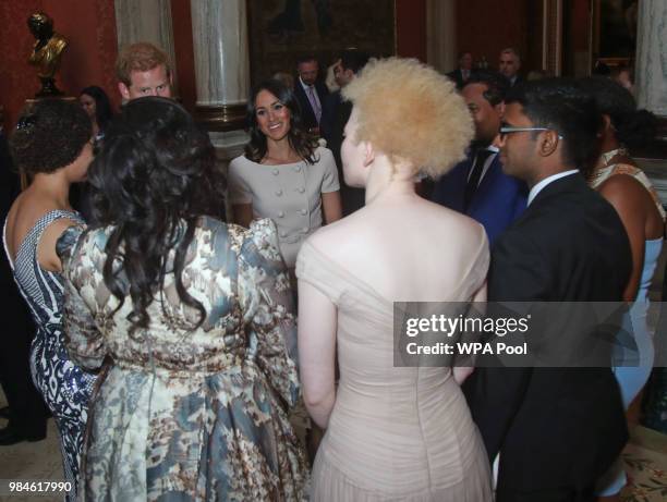 Meghan, Duchess of Sussex meets group of leaders during the Queen's Young Leaders Awards Ceremony at Buckingham Palace on June 26, 2018 in London,...