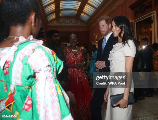 Meghan, Duchess of Sussex and Prince Harry, Duke of Sussex meet group of leaders during the Queen's Young Leaders Awards Ceremony at Buckingham...