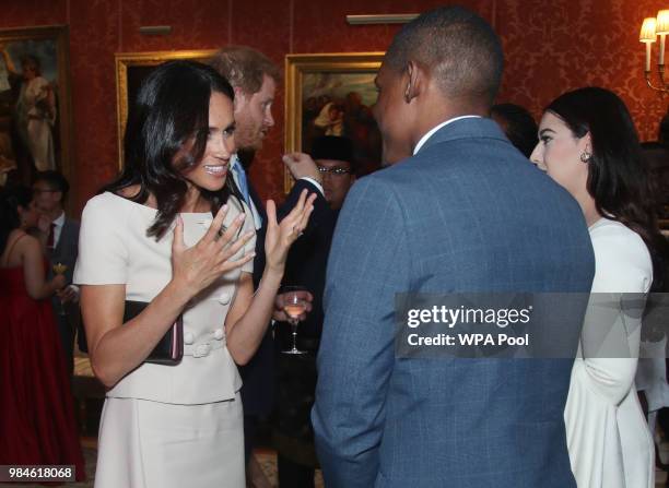 Meghan, Duchess of Sussex meets group of leaders during the Queen's Young Leaders Awards Ceremony at Buckingham Palace on June 26, 2018 in London,...