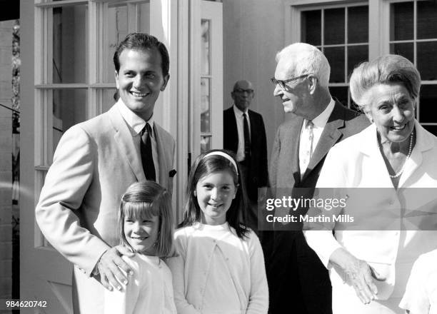 American singer, composer, actor, writer and television personality Pat Boone, along with daughters Debby and Cherry, attend May Day at John Thomas...