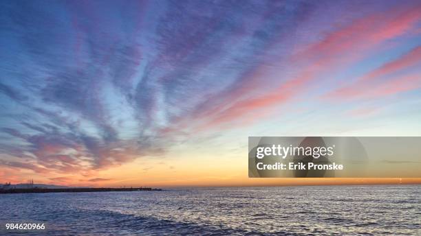 dawn, barceloneta beach - barceloneta beach stock pictures, royalty-free photos & images