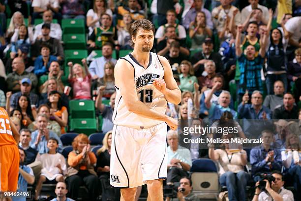 Mehmet Okur of the Utah Jazz cheers after making a three-point shot against the Phoenix Suns at EnergySolutions Arena on April 14, 2010 in Salt Lake...