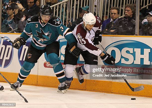Chris Stewart of the Colorado Avalanche skates against Douglas Murray of the San Jose Sharks in Game One of the Western Conference Quarterfinals...