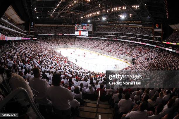 Fans participate in a "WhiteOut" as the Phoenix Coyotes take on the Detroit Red Wings in Game One of the Western Conference Quarterfinals during the...