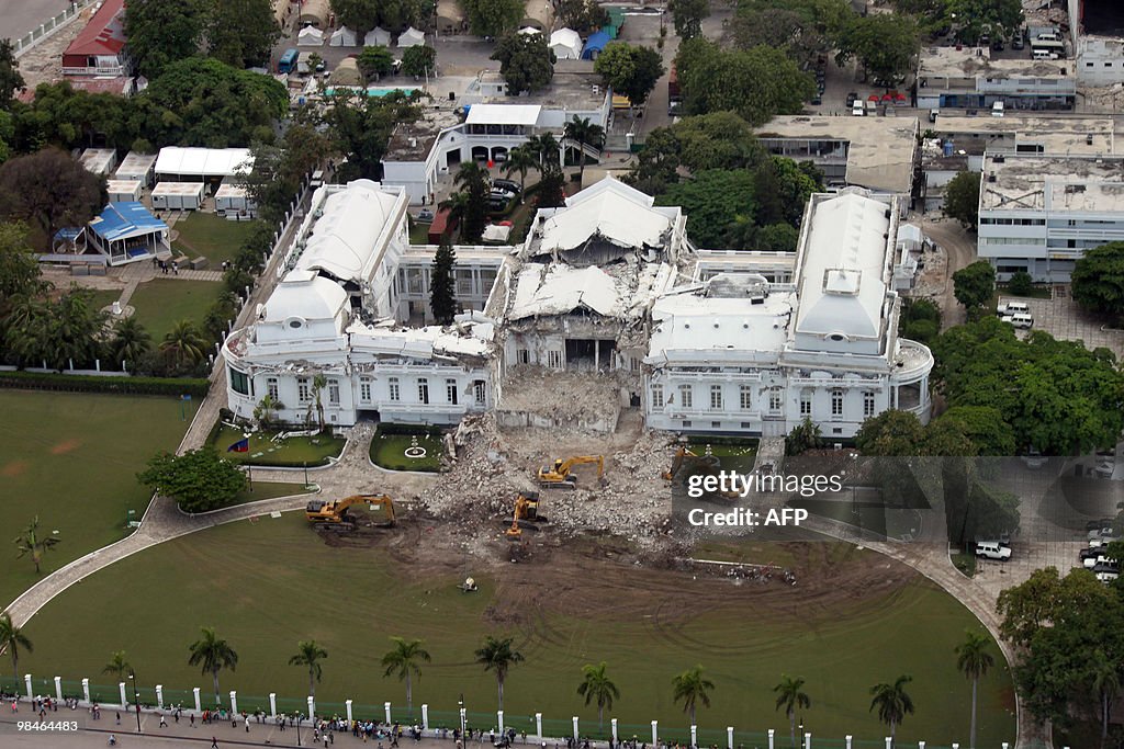 Bulldozers raze Haiti's presidential pal
