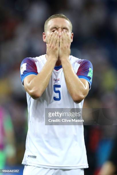 Sverrir Ingason of Iceland looks dejected following his sides defeat in the 2018 FIFA World Cup Russia group D match between Iceland and Croatia at...