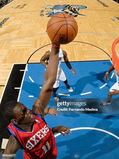 Jrue Holiday of the Philadelphia 76ers shoots against the Orlando Magic during the game on April 14, 2010 at Amway Arena in Orlando, Florida. NOTE TO...