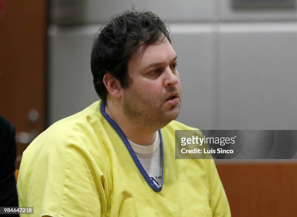 Blake Leibel listens impassively as Judge Mark E. Windham sentences the former graphic novelist to life in prison without the possibility of parole...