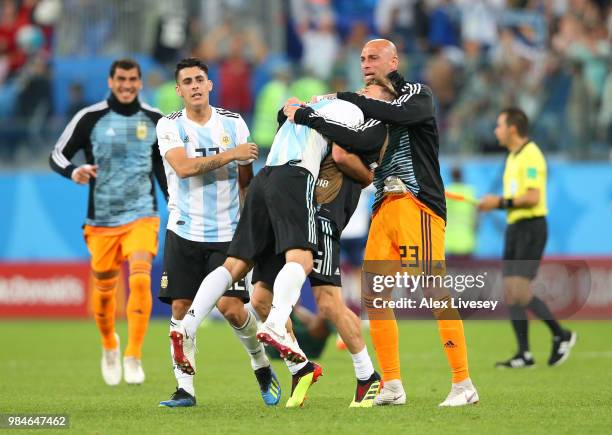 Cristian Pavon, Javier Mascherano, Lucas Biglia and Wilfredo Caballero of Argentina celebrate following the 2018 FIFA World Cup Russia group D match...