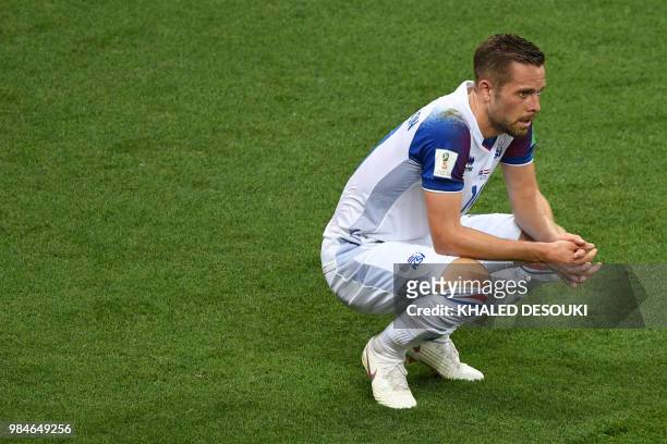 Iceland's midfielder Gylfi Sigurdsson reacts at the end of the Russia 2018 World Cup Group D football match between Iceland and Croatia at the Rostov...