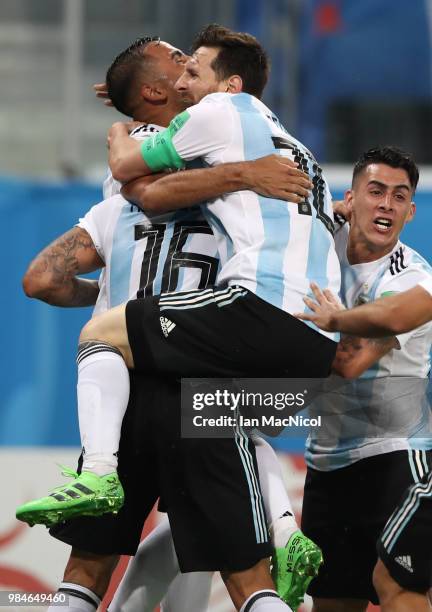 Lionel Messi of Argentinacelebrates with Marcos Rojo of Argentina after he scores the winning goal during the 2018 FIFA World Cup Russia group D...
