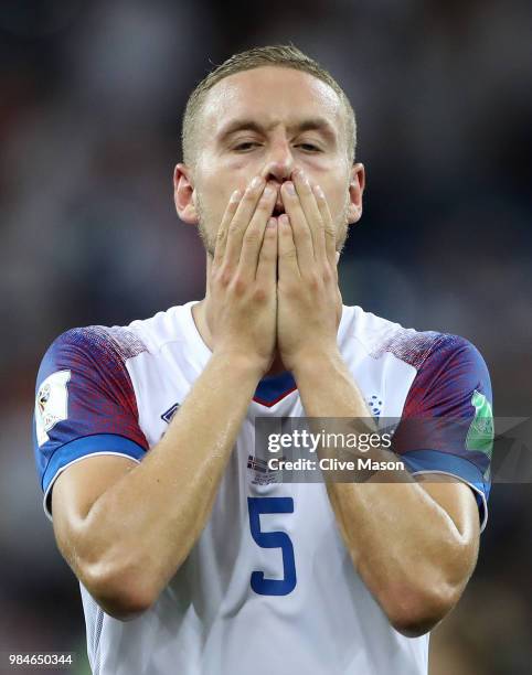 Sverrir Ingason of Iceland looks dejected following his sides defeat in the 2018 FIFA World Cup Russia group D match between Iceland and Croatia at...