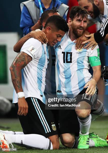 Lionel Messi of Argentinacelebrates with Marcos Rojo of Argentina after he scores the winning goal during the 2018 FIFA World Cup Russia group D...
