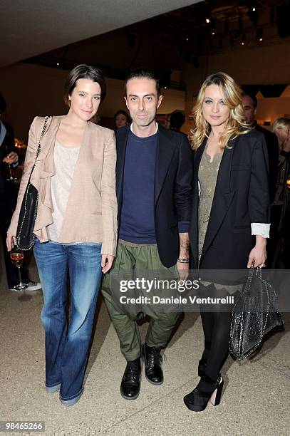 Martina Codecasa, Giambattista Valli and Carolina Crescentini attend the Stella McCartney And Established & Sons Dinner on April 14, 2010 in Milan,...