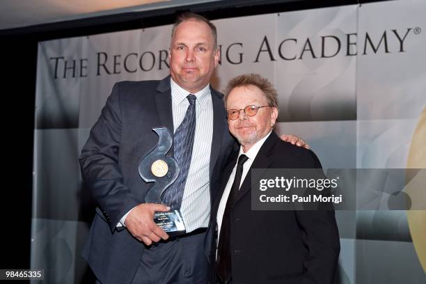 Honoree Garth Brooks poses for a photo with songwriter Paul Williams at the GRAMMYs on the Hill awards at The Liaison Capitol Hill Hotel on April 14,...