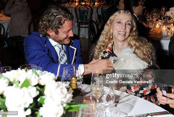 Lapo Elkann and Franca Sozzani attend Stella McCartney And Established & Sons Dinner on April 14, 2010 in Milan, Italy.