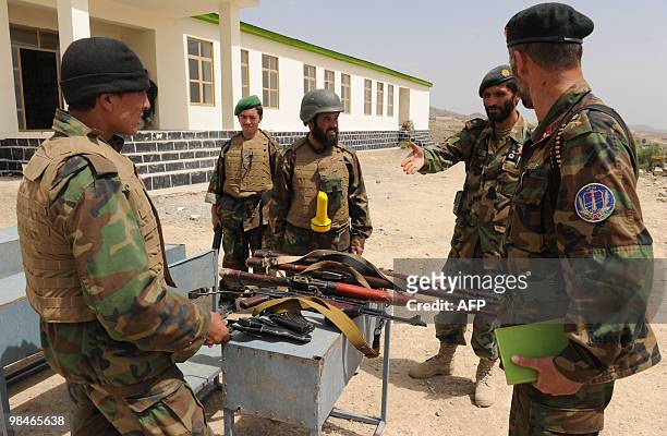 To go with Afghanistan-Pakistan-unrest-Haqqani,FOCUS by Charlotte McDonald-Gibson In this photo taken on April 8 Afghan National Army soldiers near...
