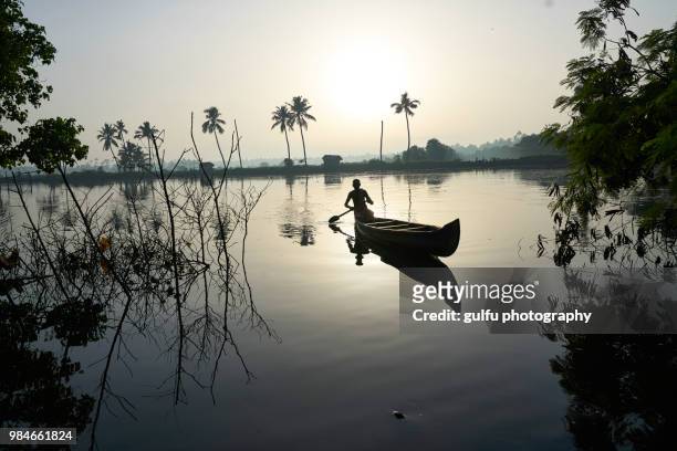 serene kadamakkudy,kerala - reflection water india stock pictures, royalty-free photos & images