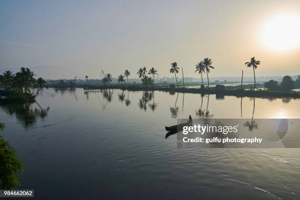 serene kadamakkudy,kerala - fish hatchery stock-fotos und bilder