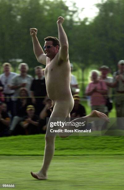 Streaker runs across the 18th green during the final round the Benson & Hedges International open held at the Belfry, Birmingham, England. Digital...