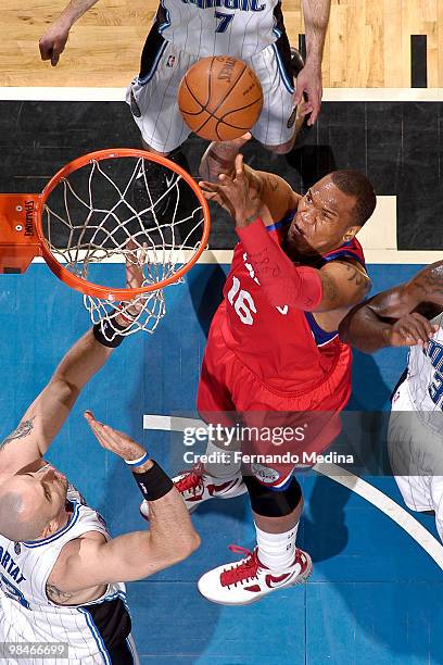 Marreese Speights of the Philadelphia 76ers shoots against the Orlando Magic during the game on April 14, 2010 at Amway Arena in Orlando, Florida....